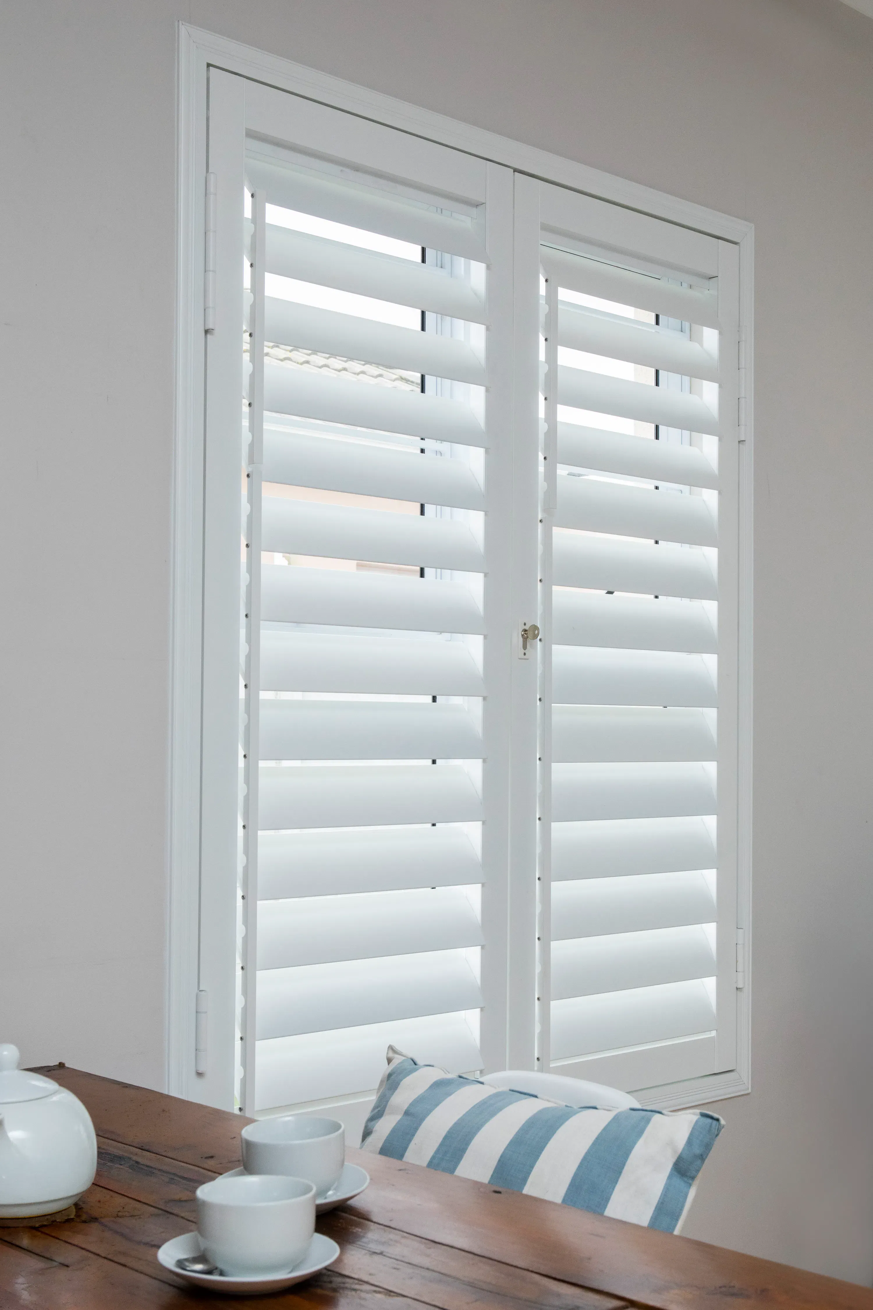 ShutterX white shutter in a dining room