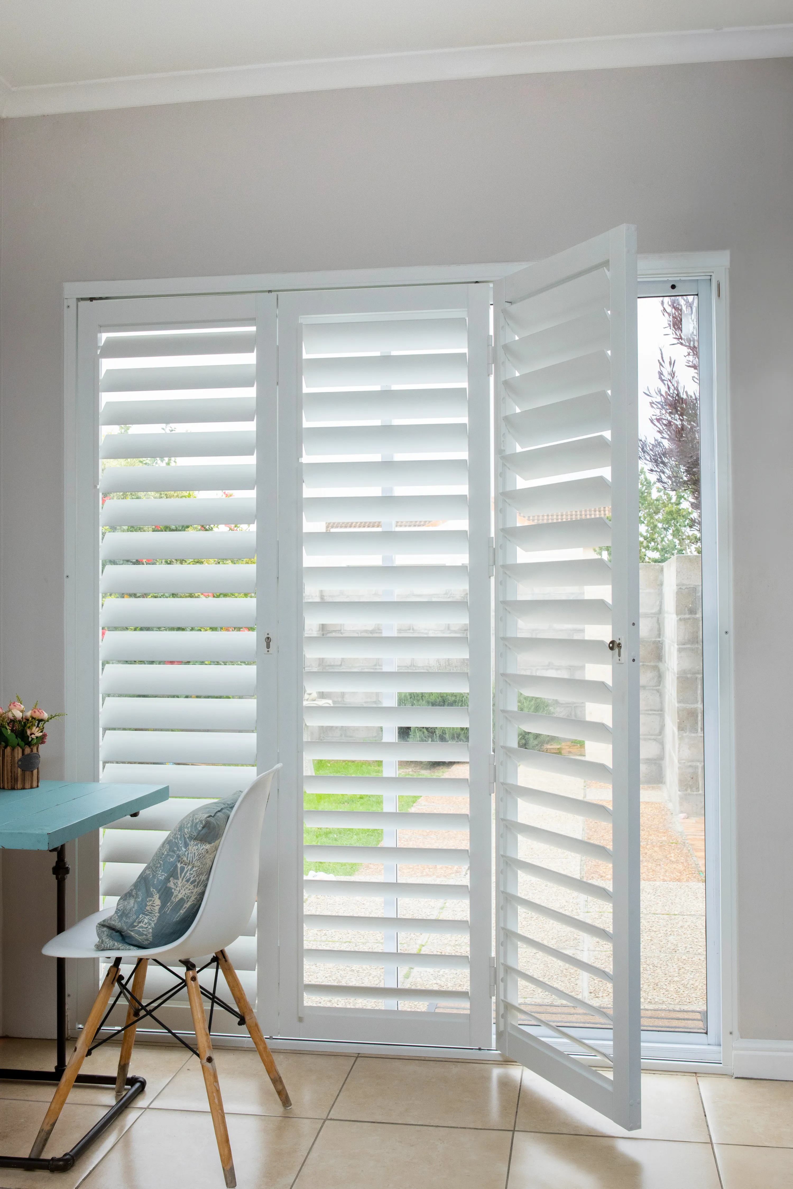 ShutterX white shutter in a dining room