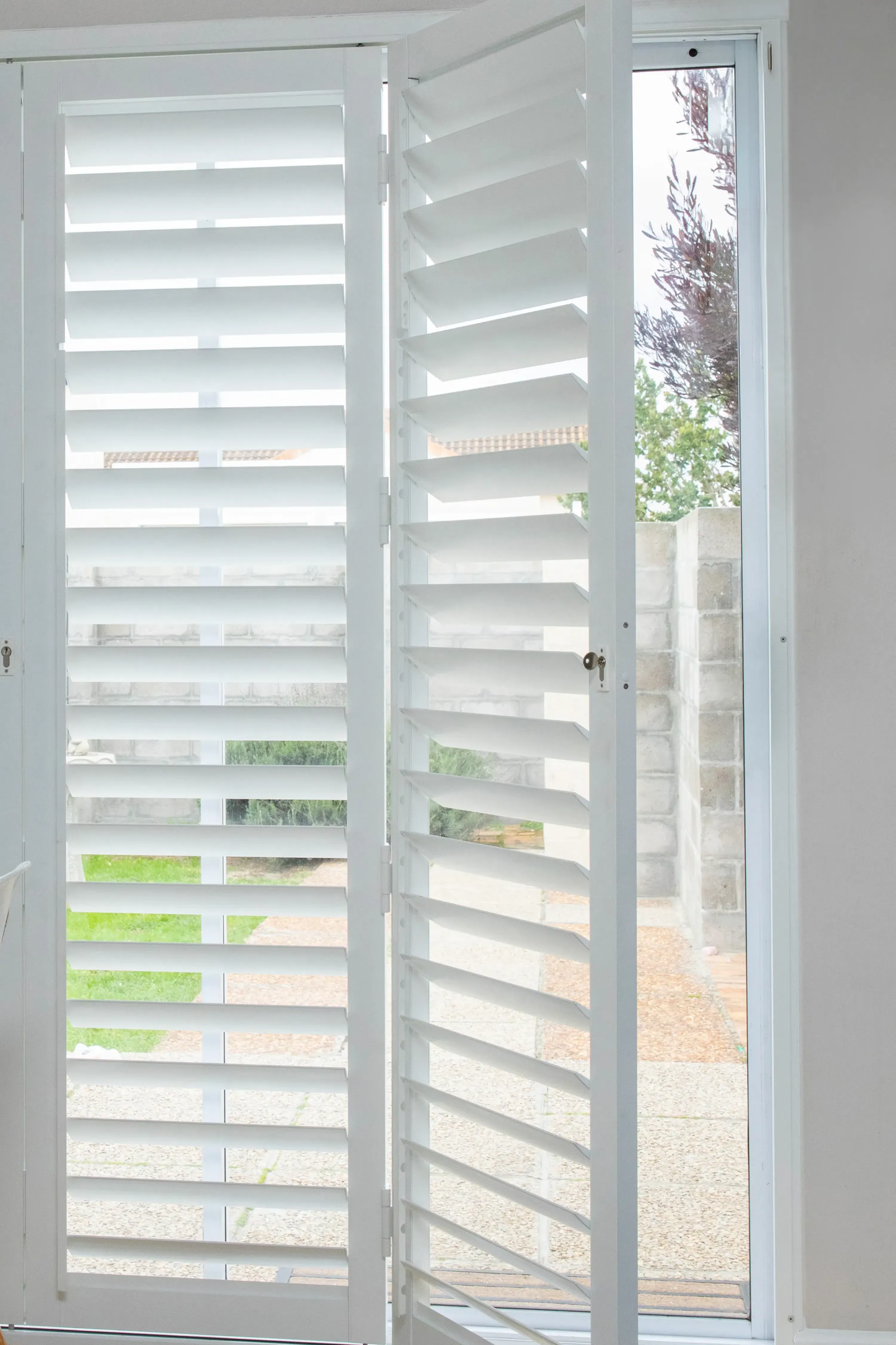 ShutterX white shutter in a dining room