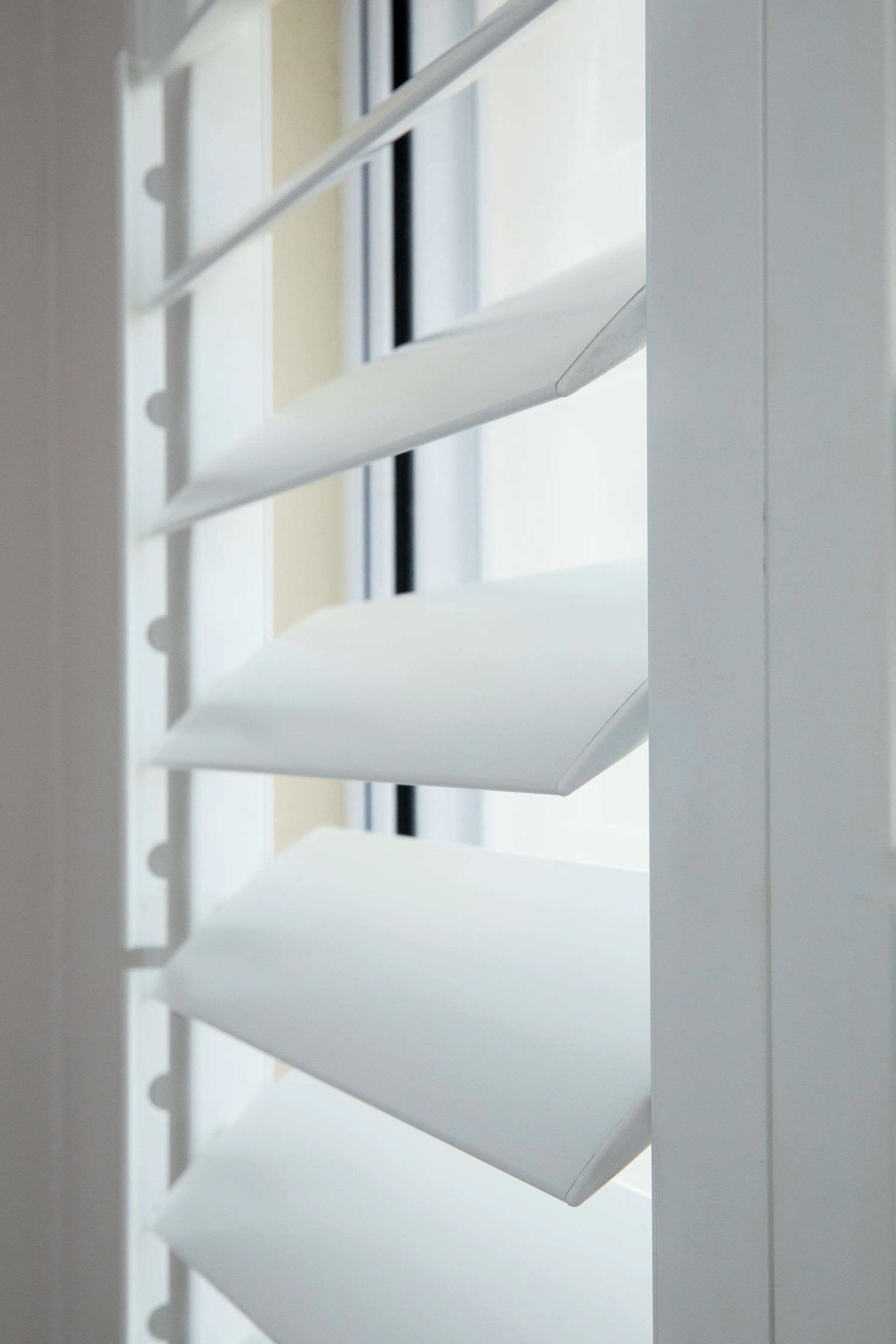 Closeup of a ShutterX white shutter
