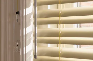Yellow venetian blinds with wand and pull cord control option
