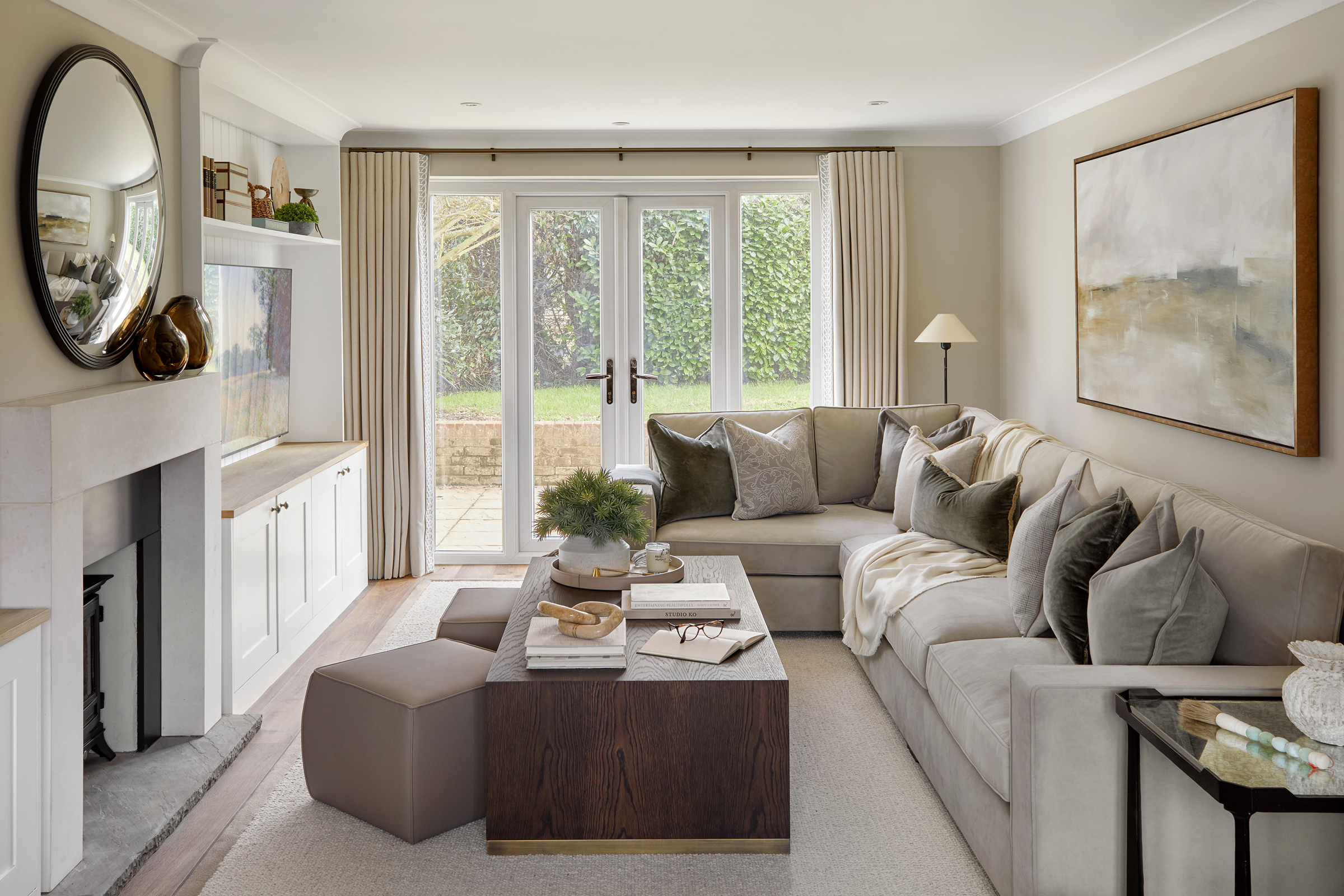 Modern Country interiors with neutral colours sofa, cushions and artwork