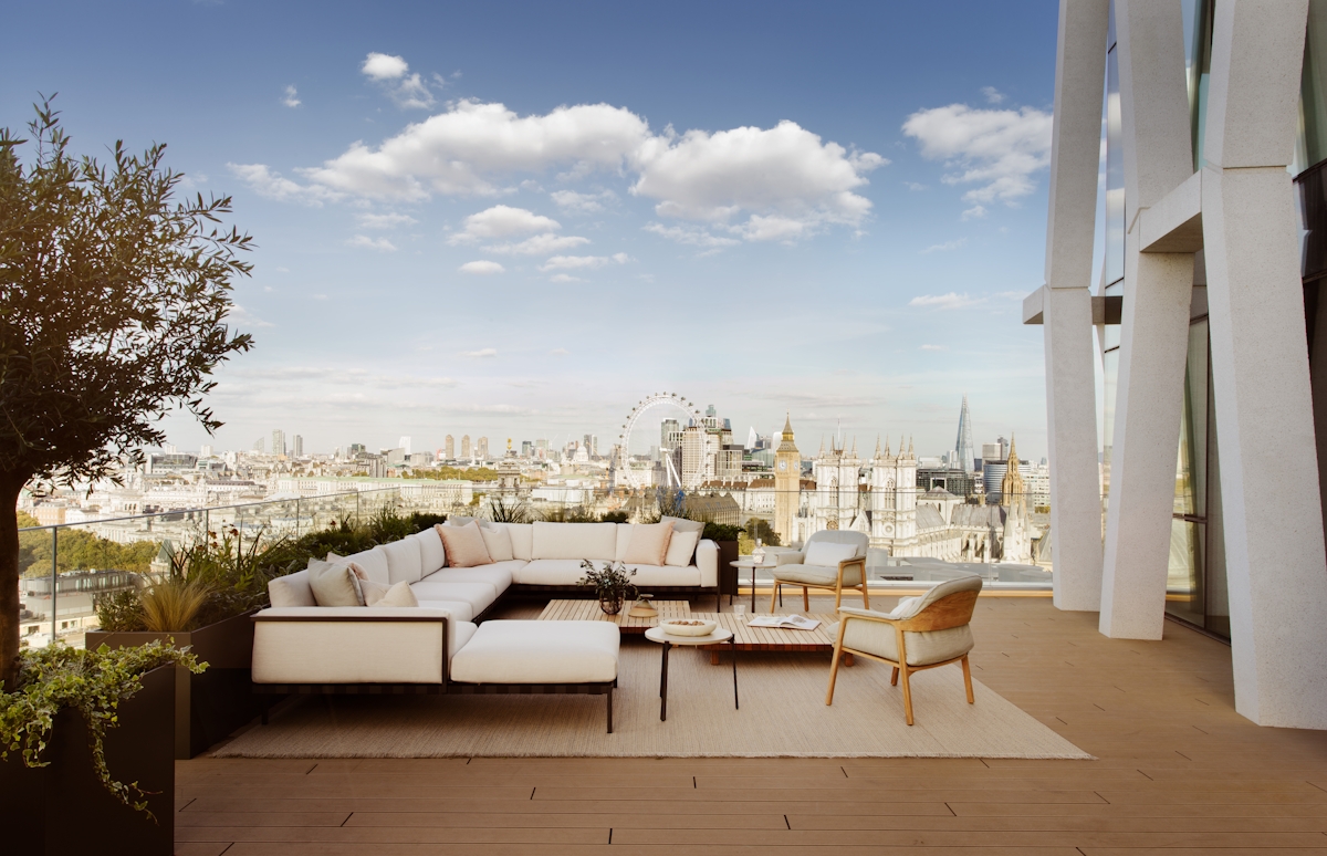 An elegantly furnished city terrace with views of the London skyline, including the London Eye; designed by Finchatton
