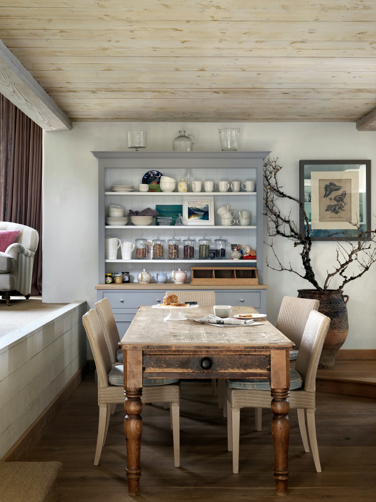 Emma Sims-Hilditch country kitchen in Wiltshire with wooden farmhouse dining table and large light grey dresser