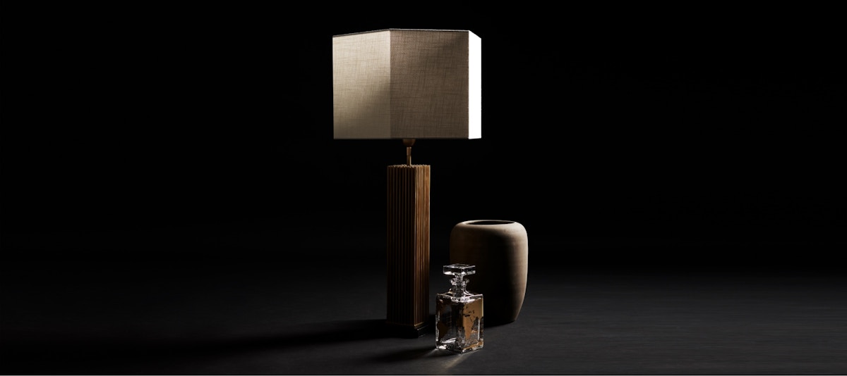 Table lamp, vase and glass decanter set on a black background