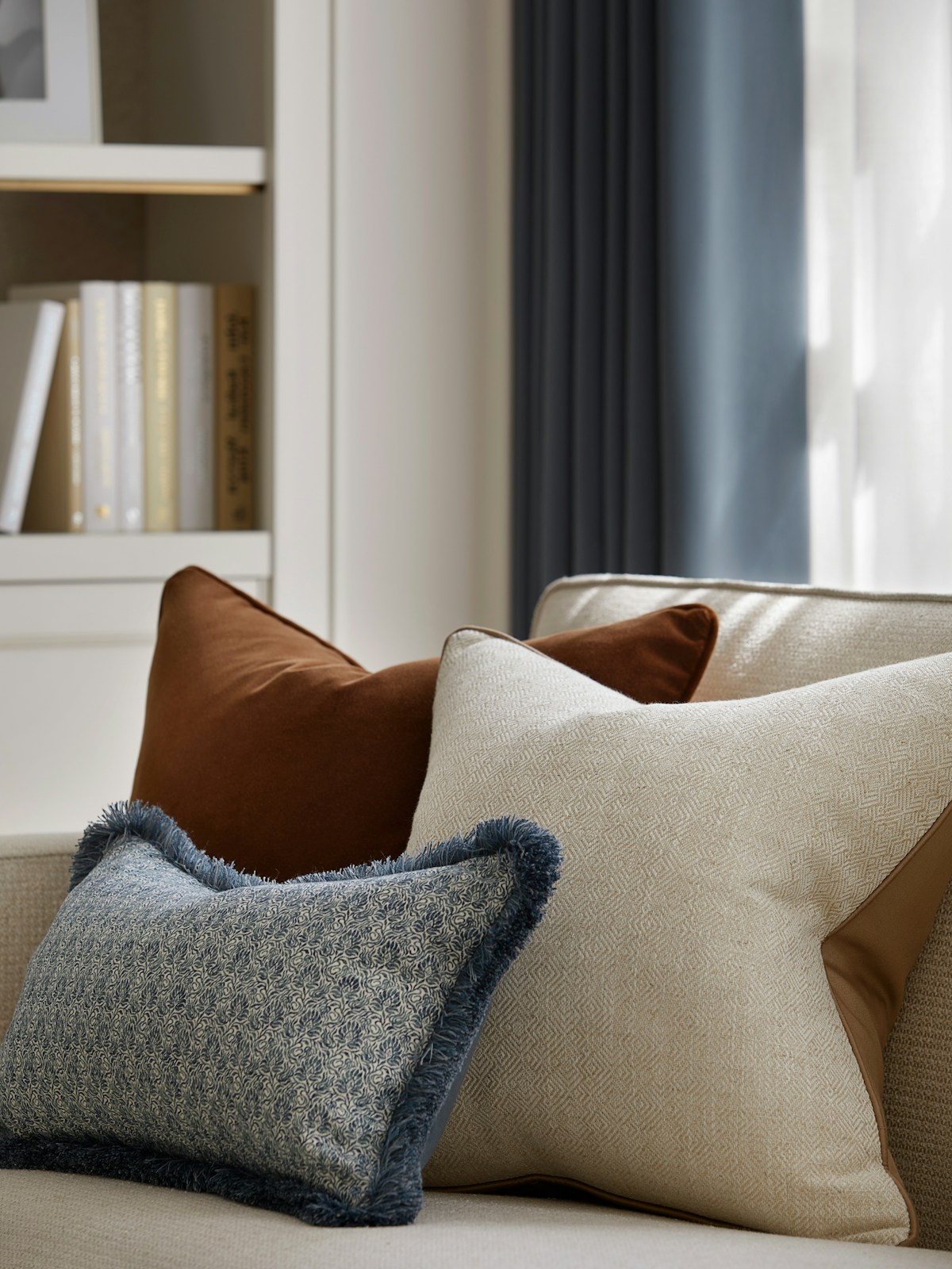 Bespoke cushions in blue, cream and burnt orange