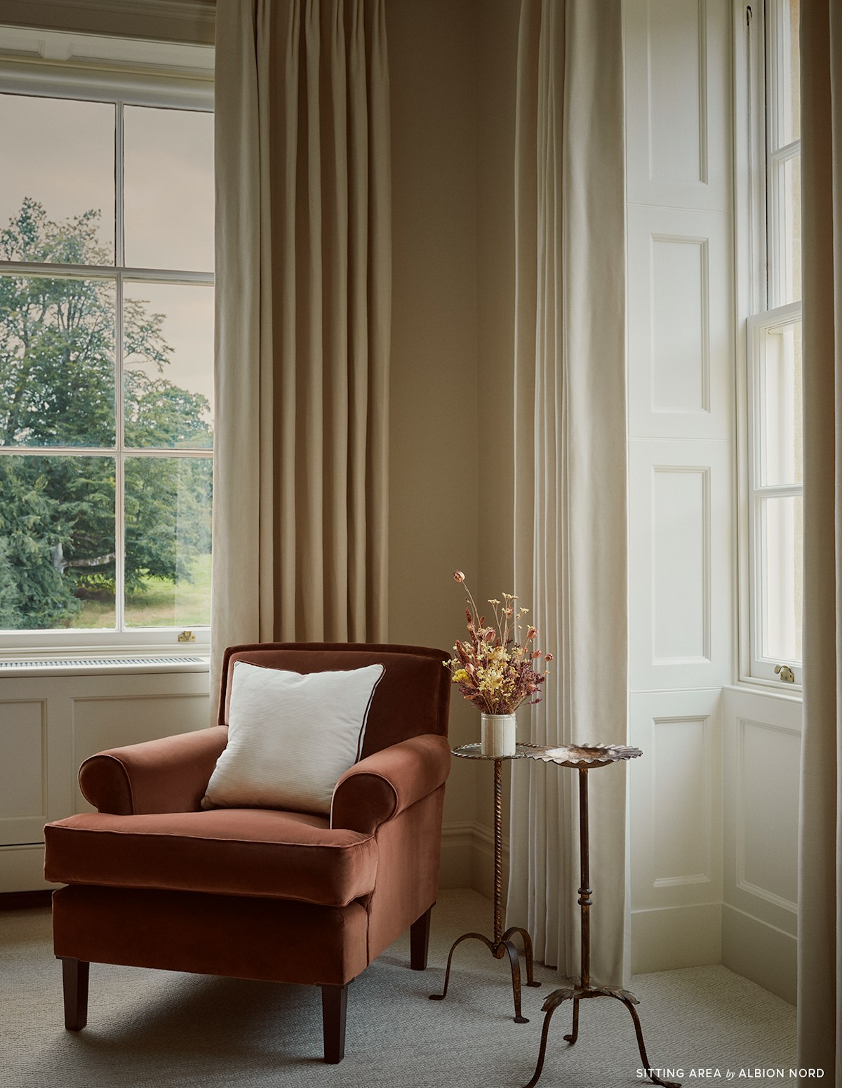 Luxury armchair and side tables in Heritage property
