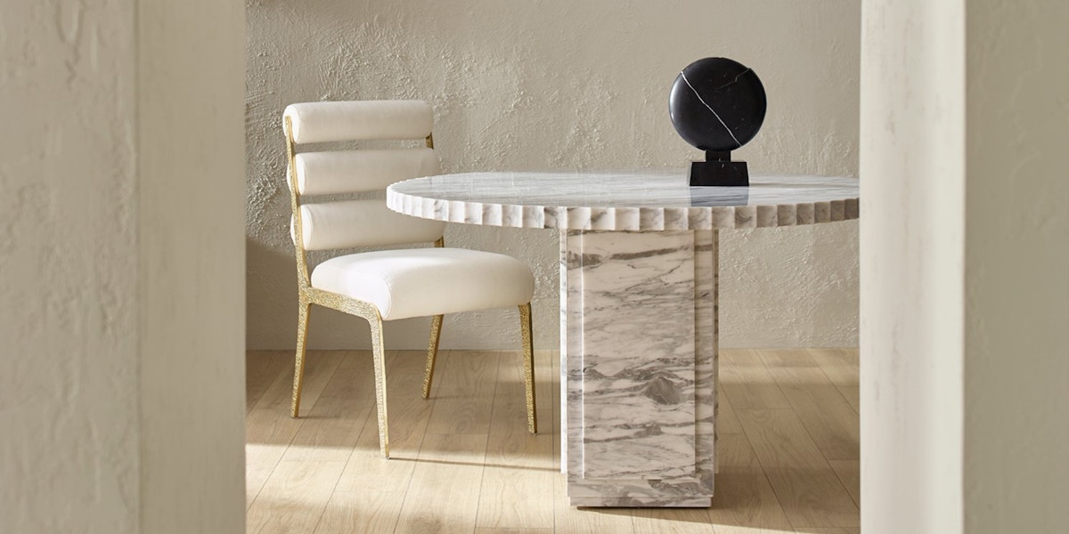 Baker Marquis marble round dining table and Lucca cream dining chair