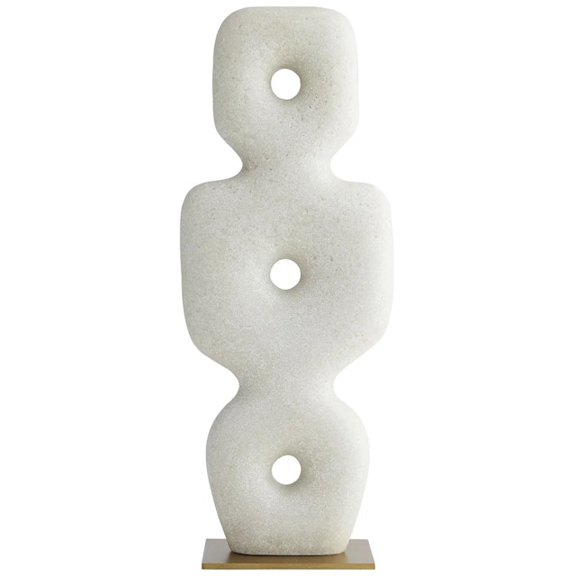 Monolithic white stone sculpture