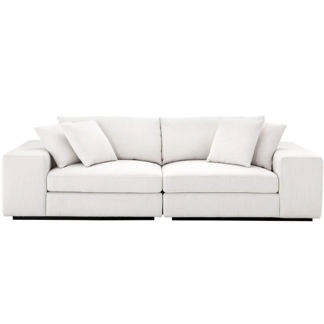 Avalon white upholstery two seater sofa with contrasting black base by Eichholtz