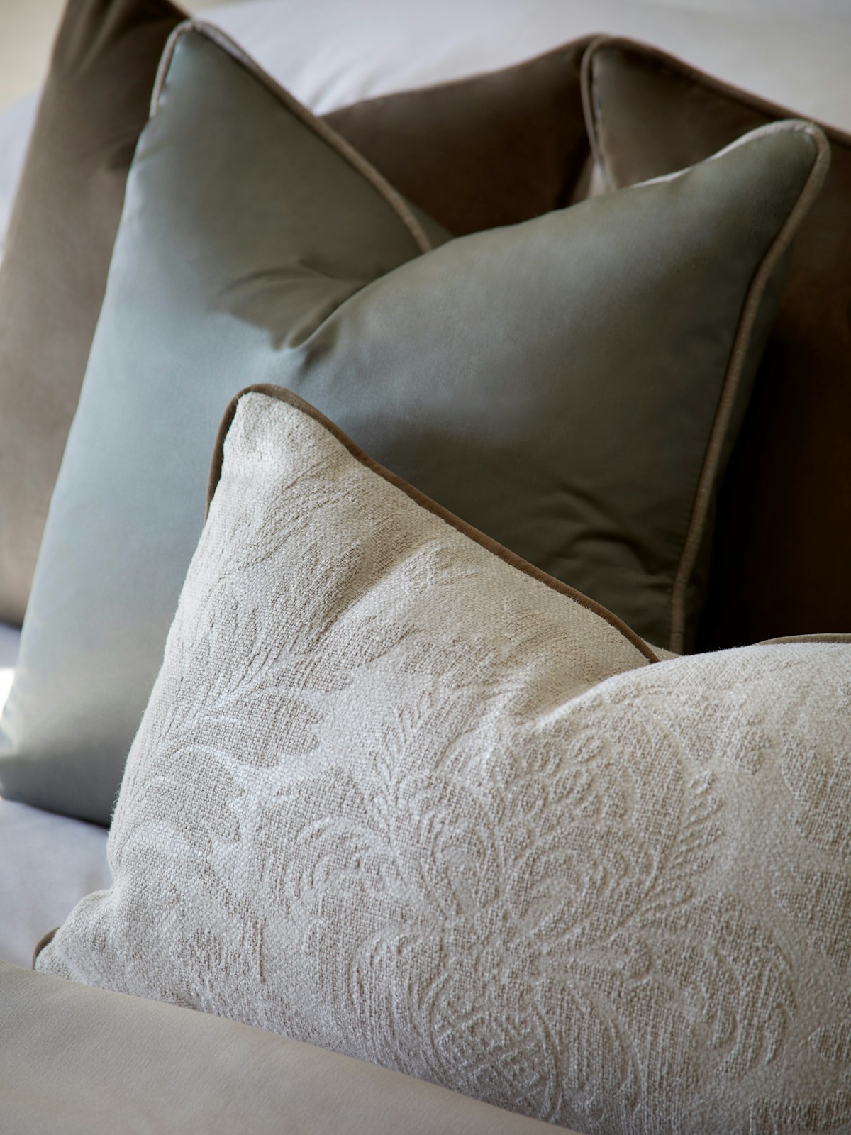 Close-up of Valentina linen cushion and Casper cushion by LuxDeco
