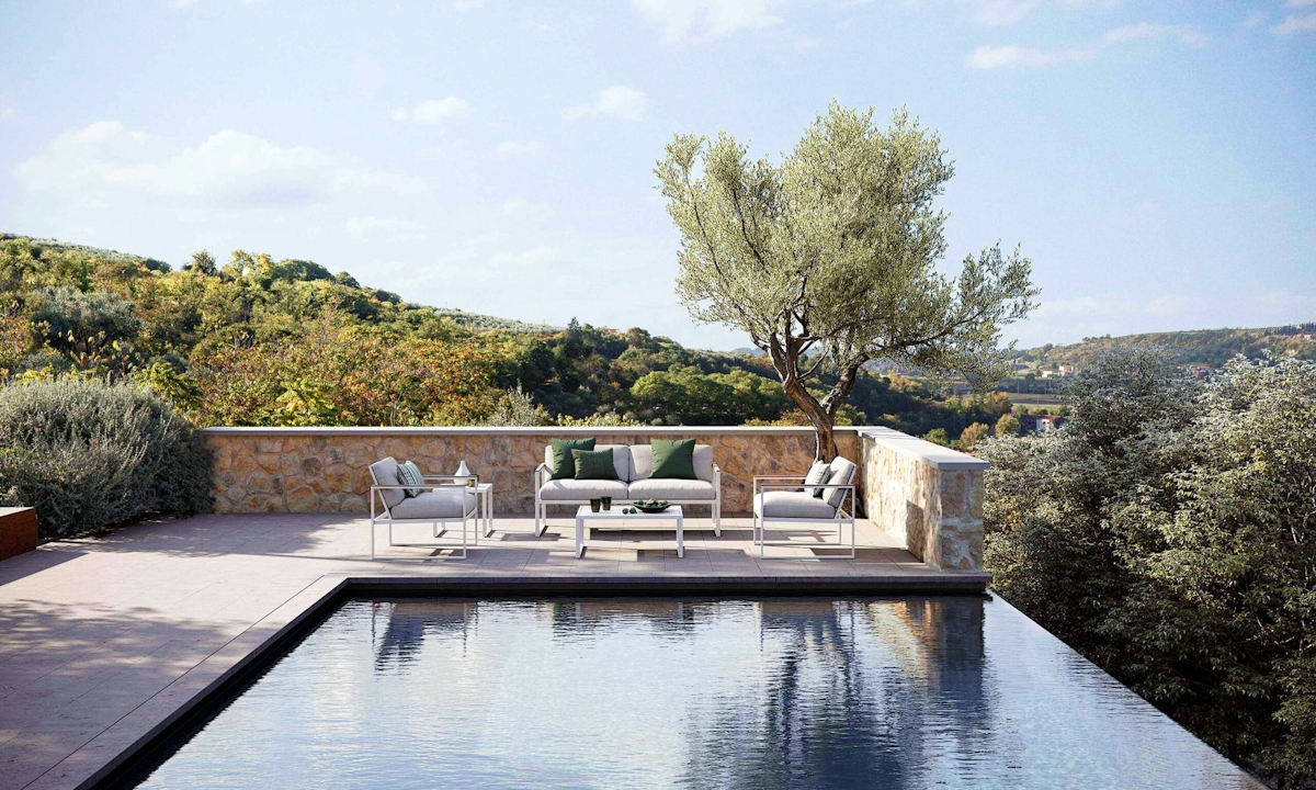 Atmosphera Quibik range of outdoor living furniture in Italian countryside setting with swimming pool