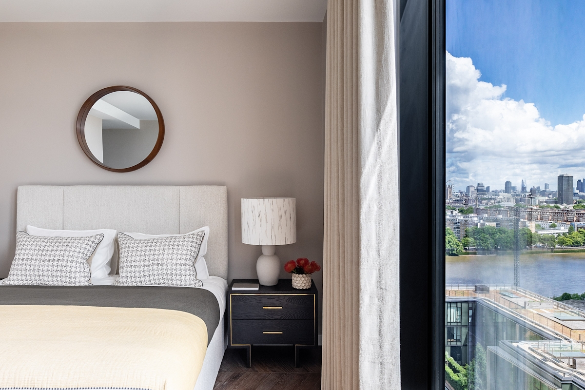 Natalia Miyar Sky Villa master bedroom with Liang & Eimil Tigur bedside table and large window with views onto the London Thames river