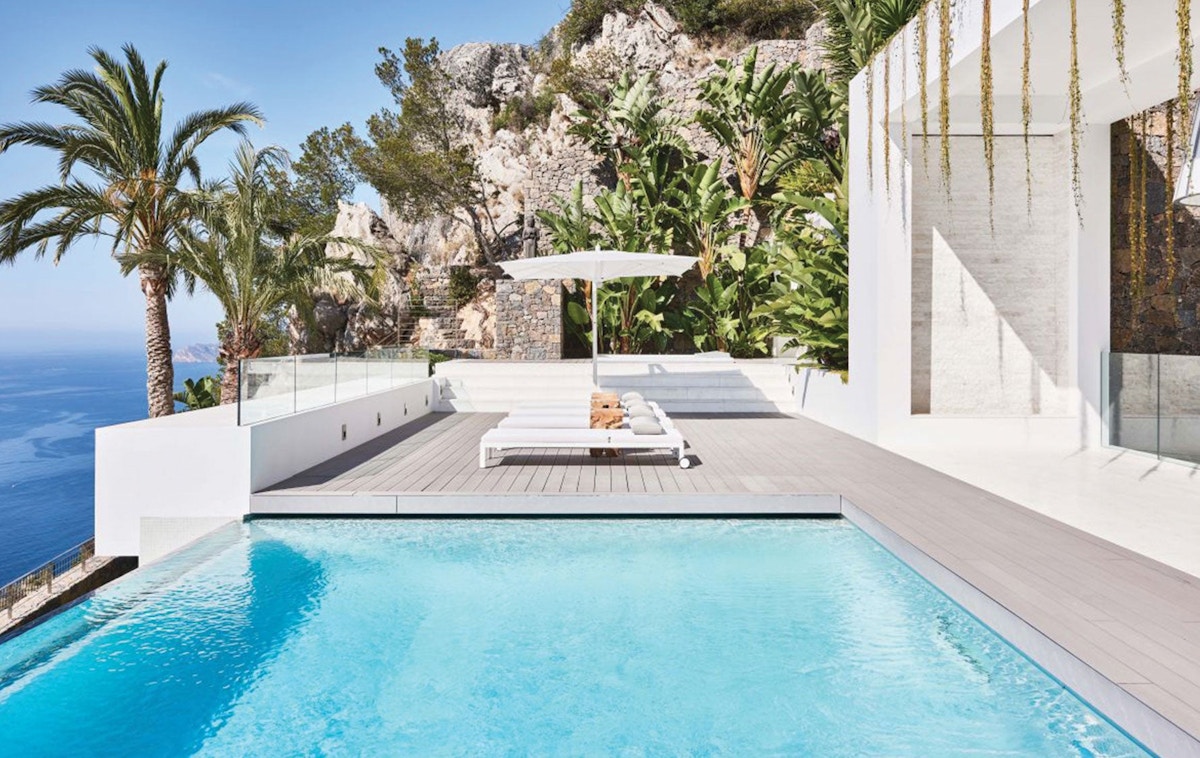 Spanish Villa Sun Loungers, Outdoor Space Ideas | Eric Kuster | Read more in The Luxurist | LuxDeco.com
