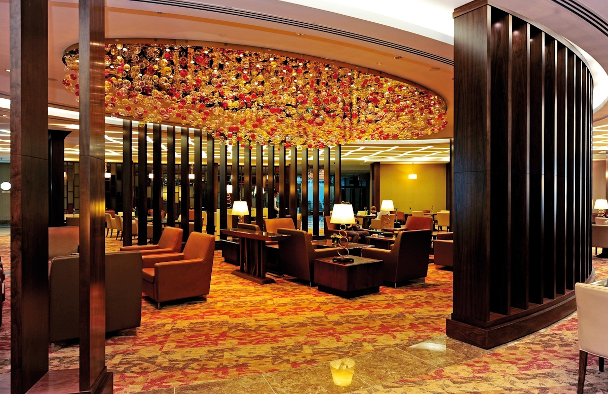 Best Airport Lounges In The World | Emirates First Class Lounge | Read more in The Luxurist at LuxDeco.com