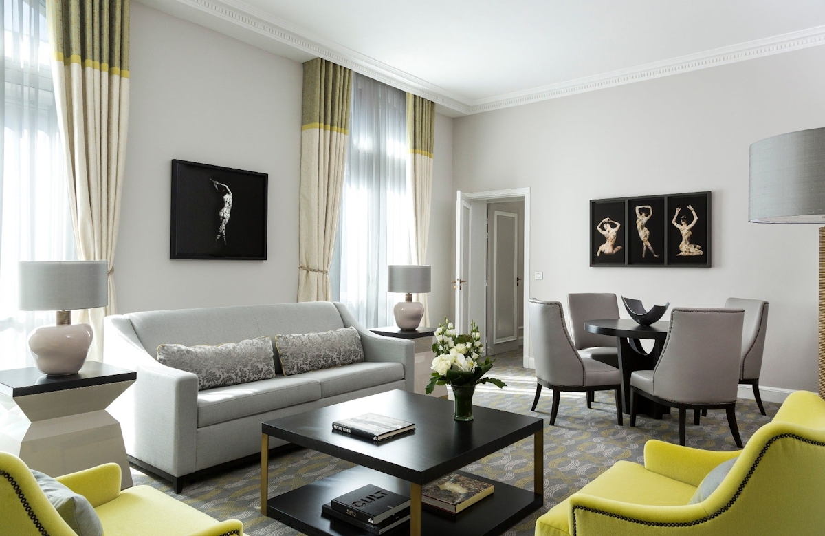 Lime Green and Light Grey Living Room | 15 Grey Living Room Ideas | Grey Lounge Colour Schemes | The Hilton Opera Paris Interiors | Read more in the LuxDeco Style Guide