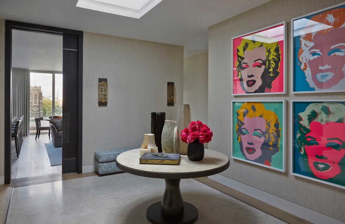 How To Style Your Round Entryway Table – Helen Green, London Interior Designer – Round Entryway Table, Andy Warhol prints – LuxDeco.com Style Guide