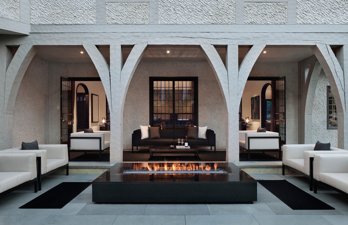 Outdoor Firepit - 8 Outdoor Lighting Ideas to Illuminate Your Garden - LuxDeco.com Style Guide