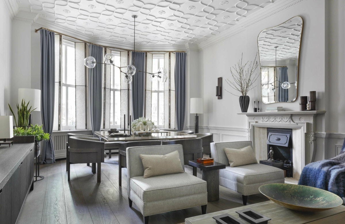 Janine Stone interiors | White and blue living room | Read more in The Luxurist