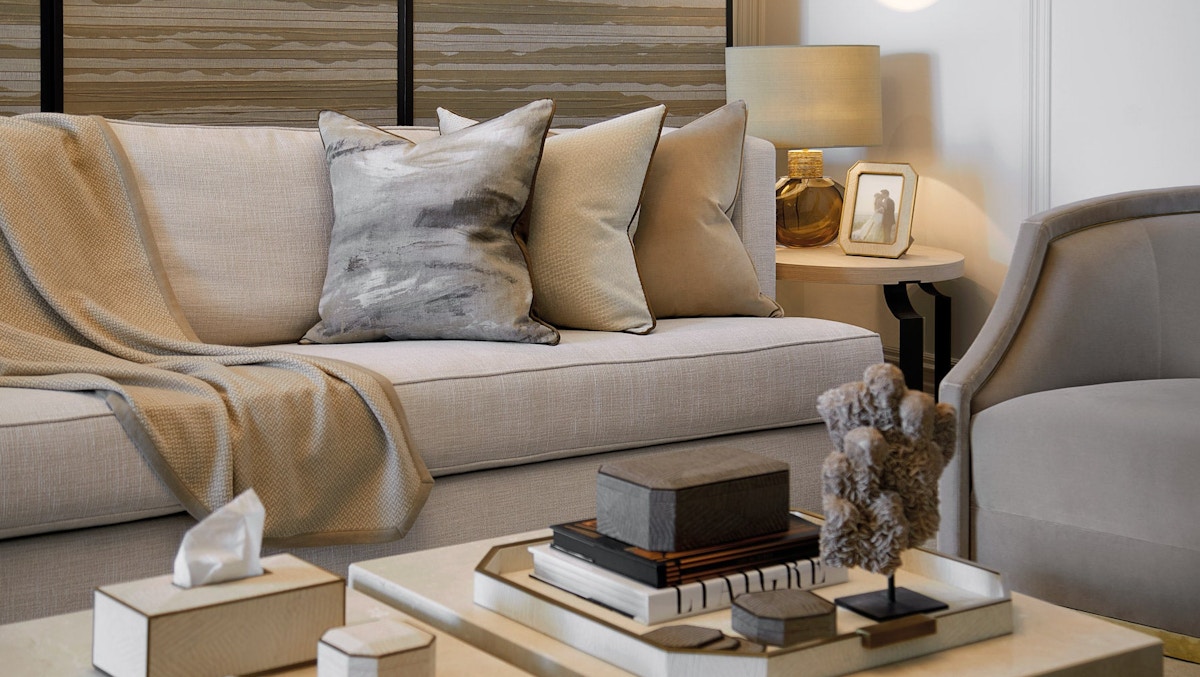 Luxury living room featuring cushions, photo frames, trays and throws from the Laura Hammett Living collection.