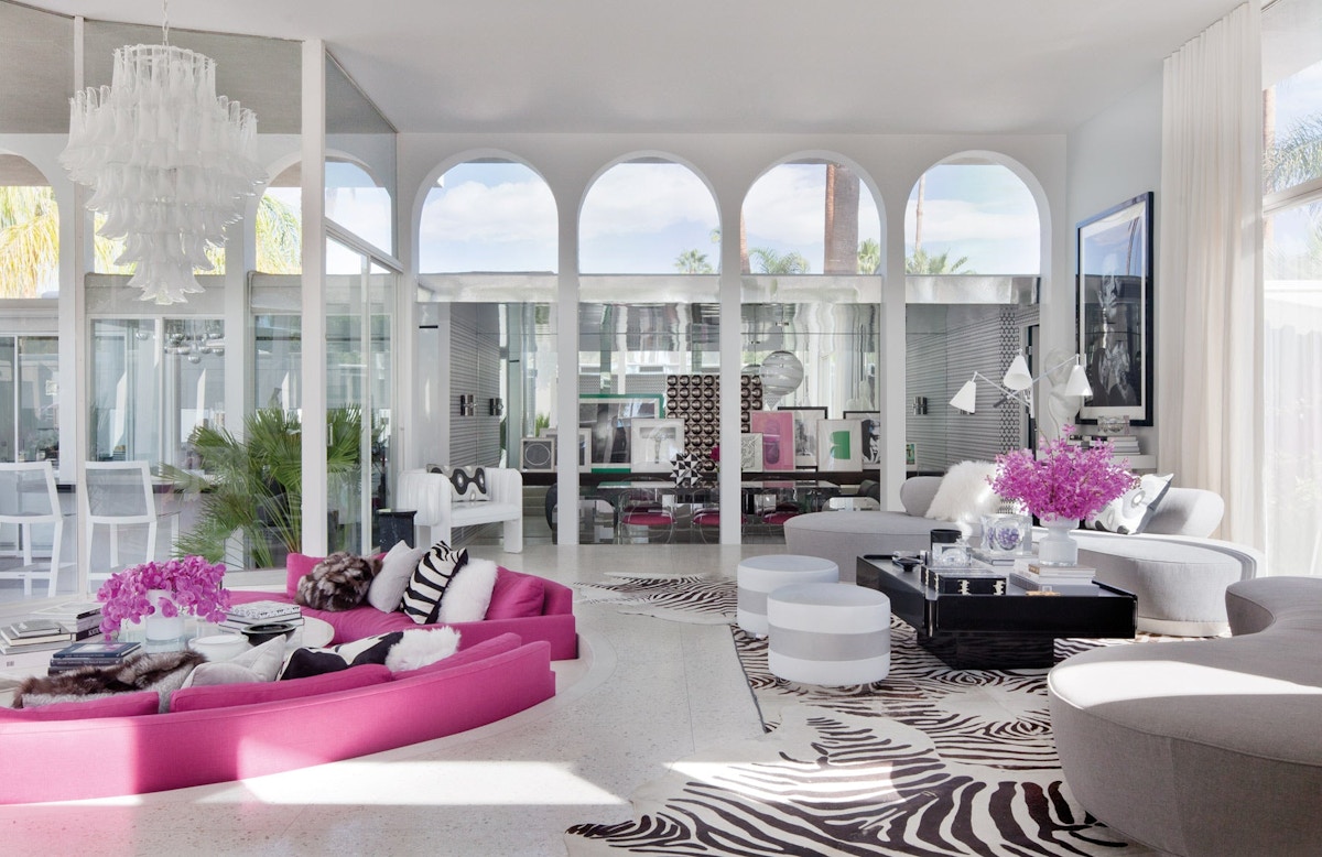 Martyn Lawrence Bullard home | Celebrity interior designer | Pink and white living room | Read more in The Luxurist at LuxDeco.com