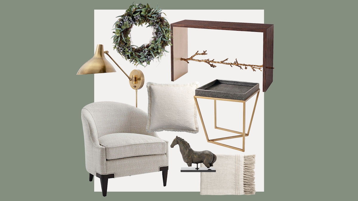 A collage of products from LuxDeco—a neutral armchair with rounded backrest, a eucalyptus and berry wreath, a wooden console table with a branch-like stretcher, a fringed white bouclé cushion, a grey horse sculpture, a brass wall light with funnel-shaped shade and a grey and gold shagreen side table
