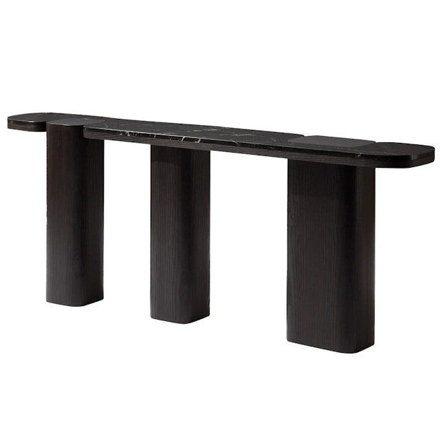 Dark console table with a marble top and three chunky legs