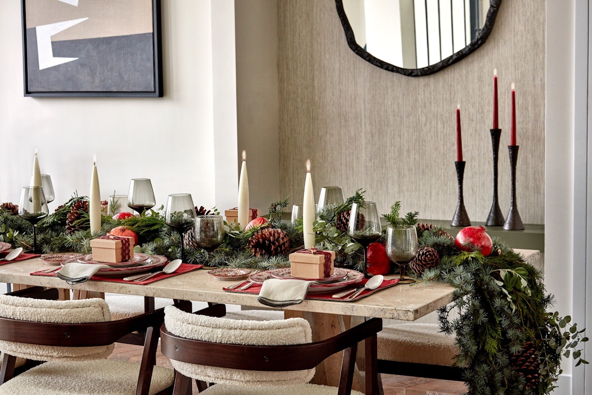 Neutral dining room designed by Natalia Miyar with Christmas tablescape 
