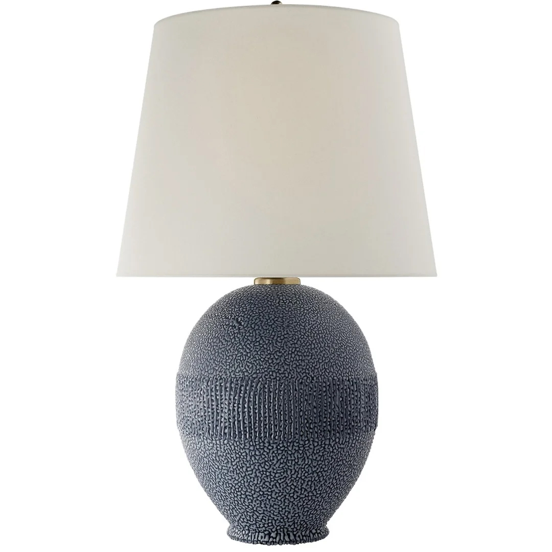 Ceramic navy blue table lamp with cream linen shade by Aerin