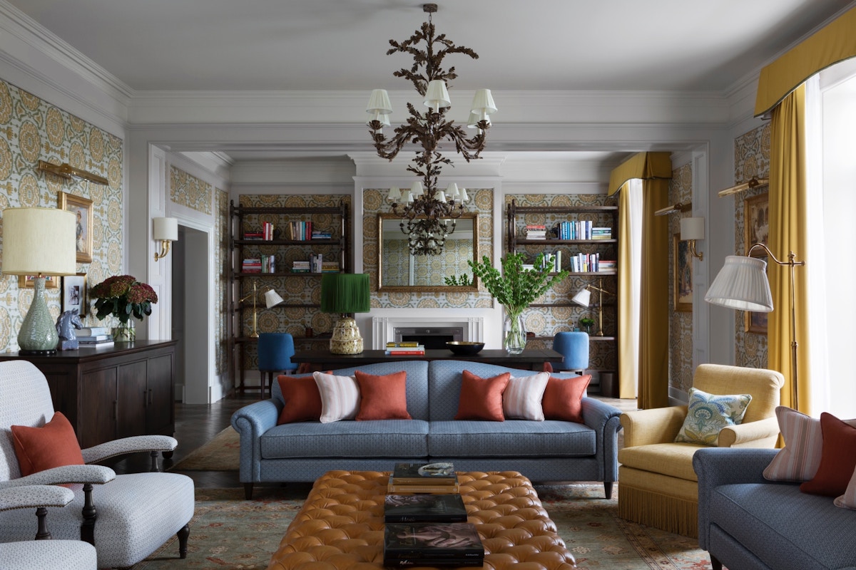 The living area of the suite of Martin Brudnizki’s Four Seasons Hotel. Yellow, blue and red heritage scheme