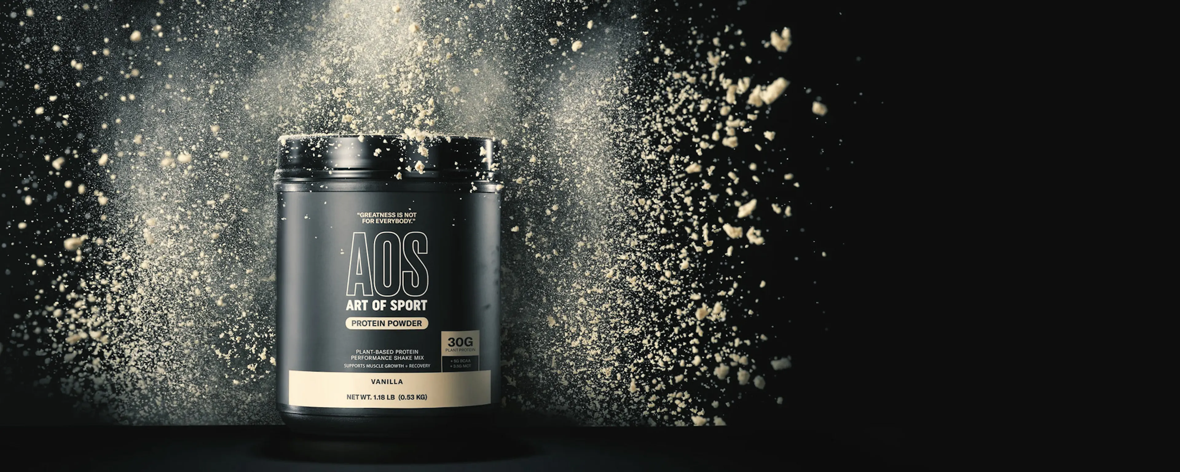 Art of Sport supplement tub in a burst of powder