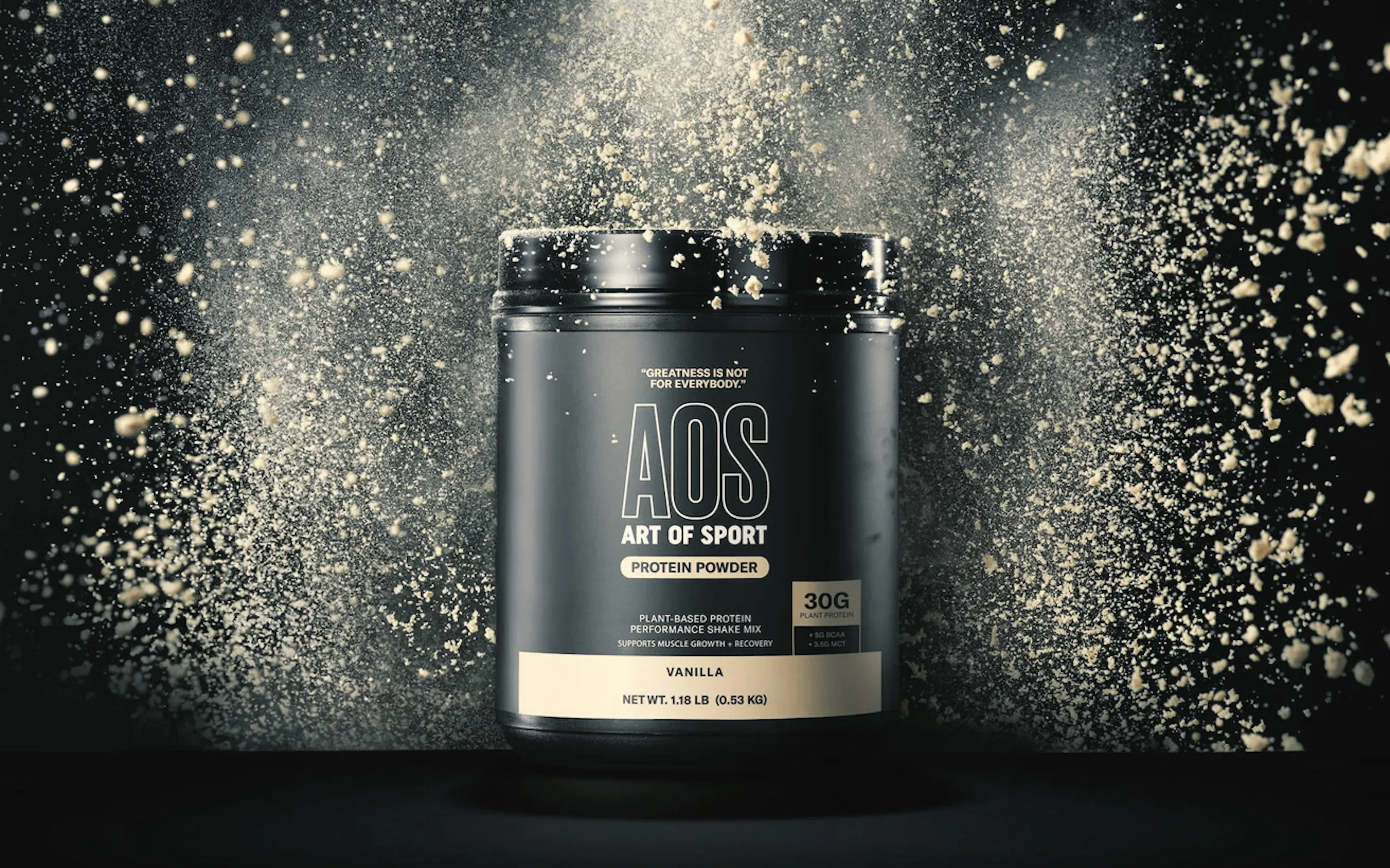 Art of Sport supplement tub in a burst of powder
