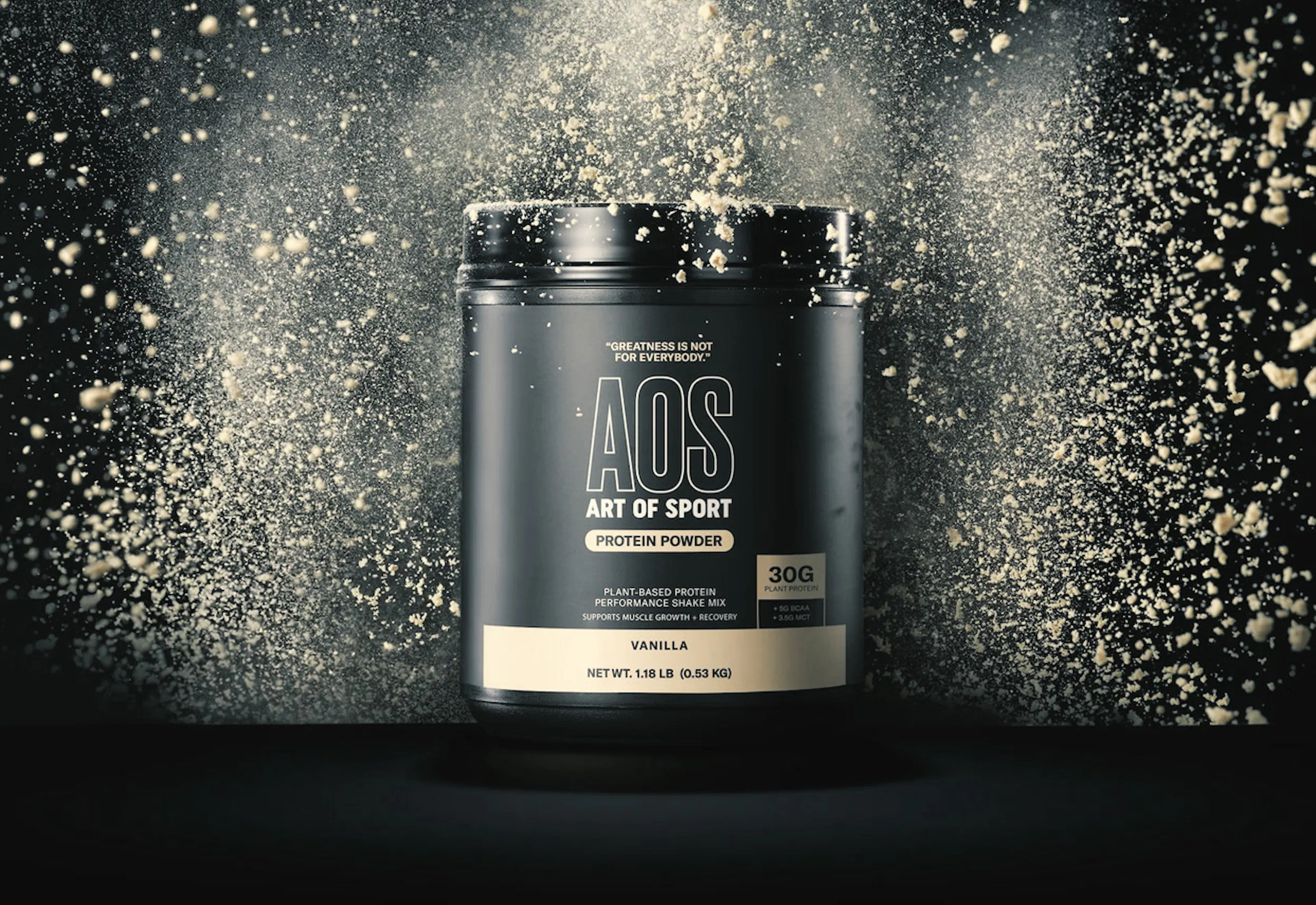 Art of Sport supplement tub in a burst of powder