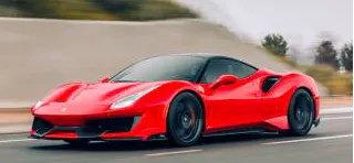 Red sports car on a road — the sale used as the first revenue recognition example