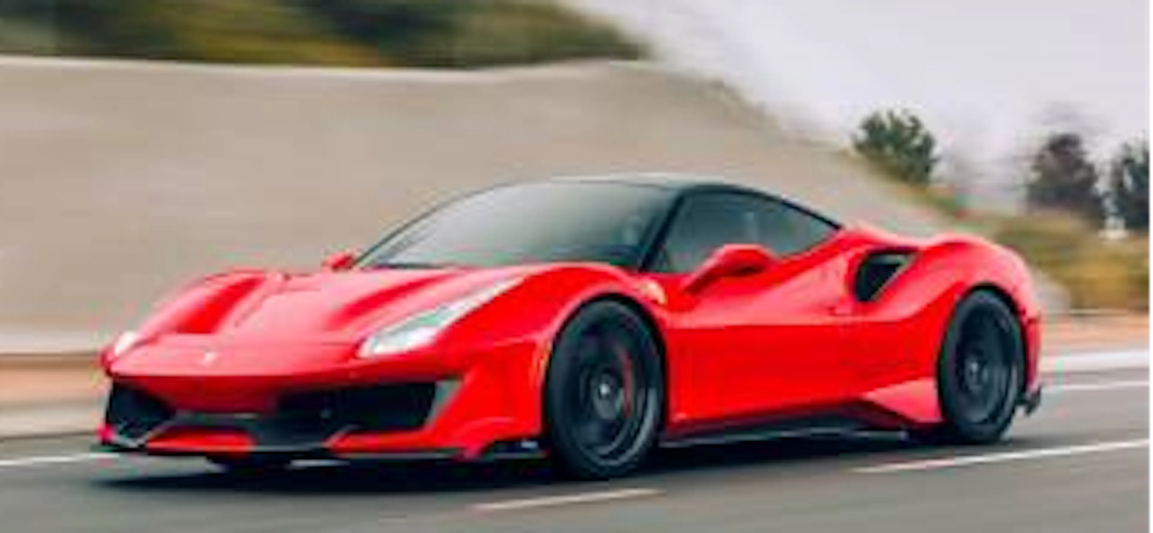 Red sports car on a road — the sale used as the first revenue recognition example