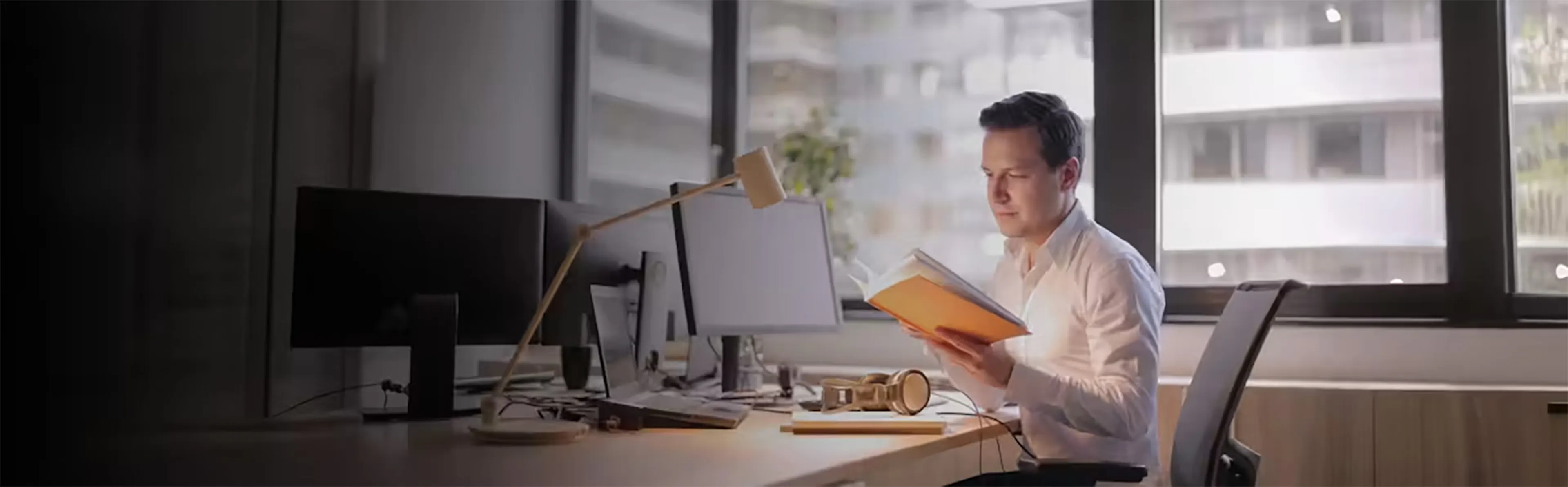 Andrew Whitegiver, Chief Technical Solutions Architect at Luxent, reviewing documents