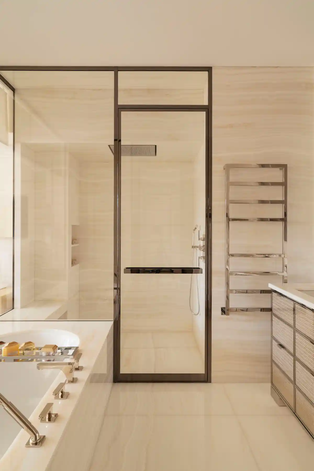 Cheval Blanc Paris - Marble bathroom with a glass rain shower