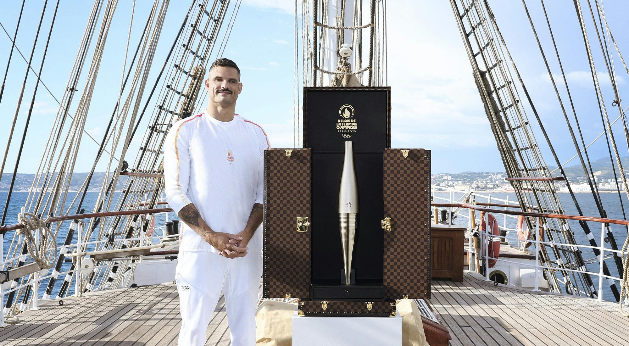 Florent Manaudou with the Olympic Flamme