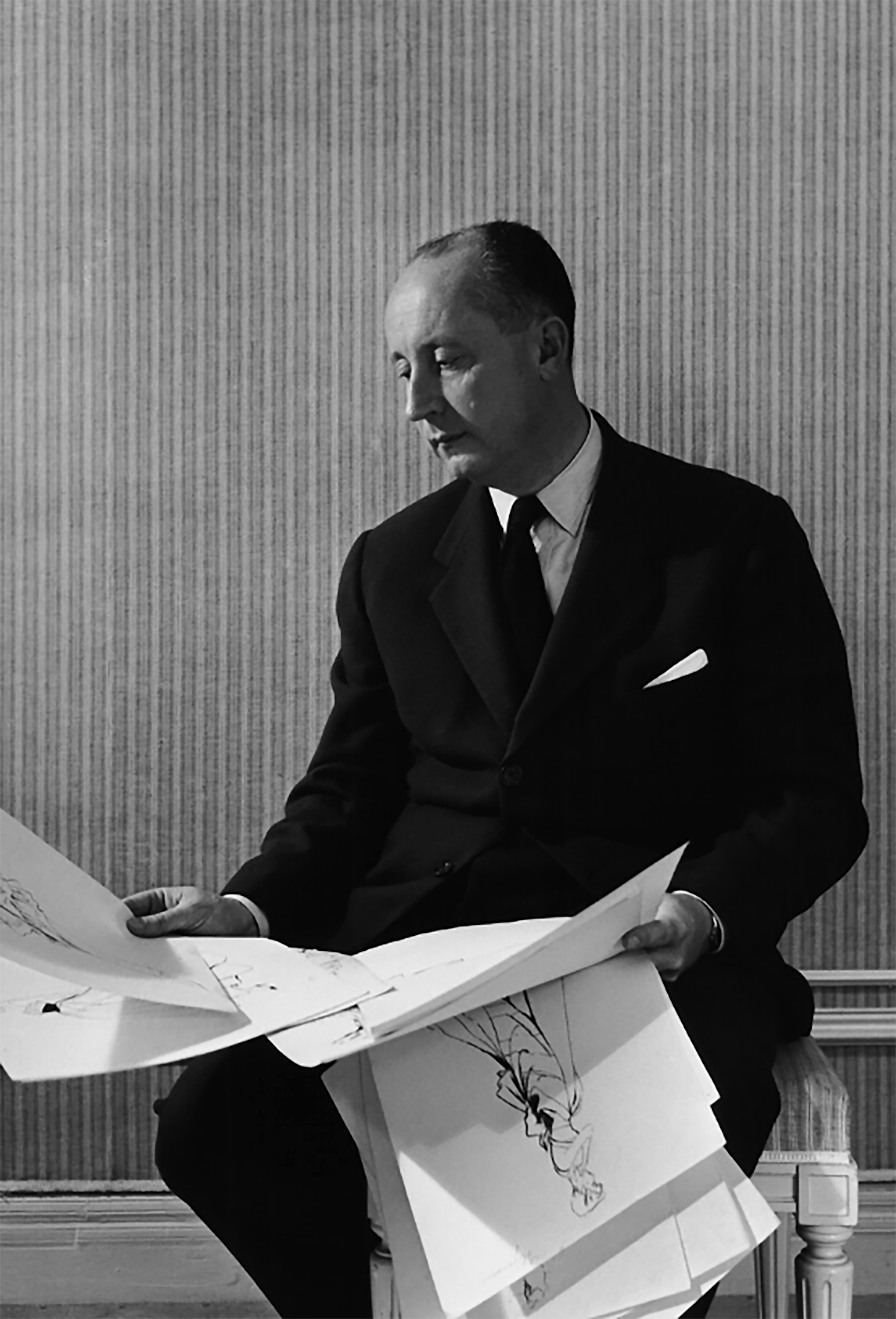 Portrait of Christian Dior, circa 1950. © Association Willy Maywald/ADAGP, Paris 2021