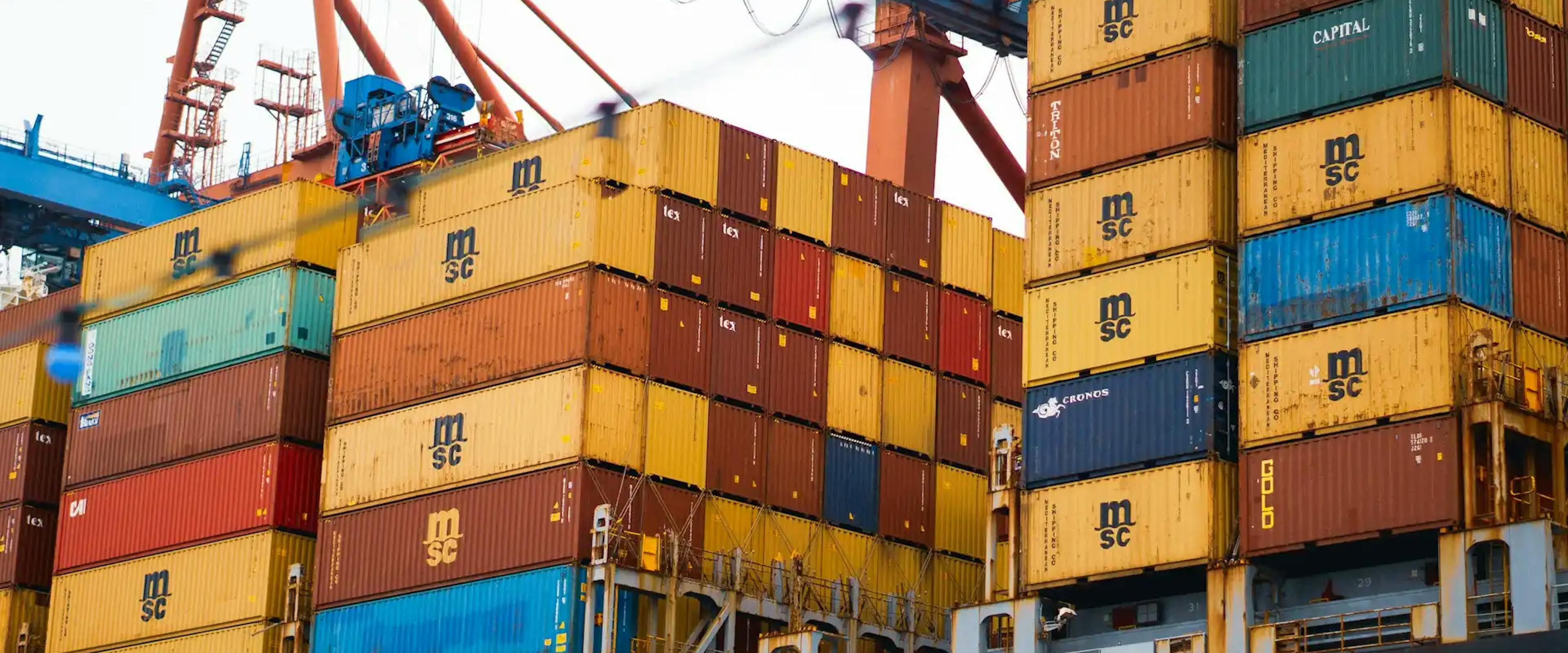 a large cargo ship loaded with lots of containers