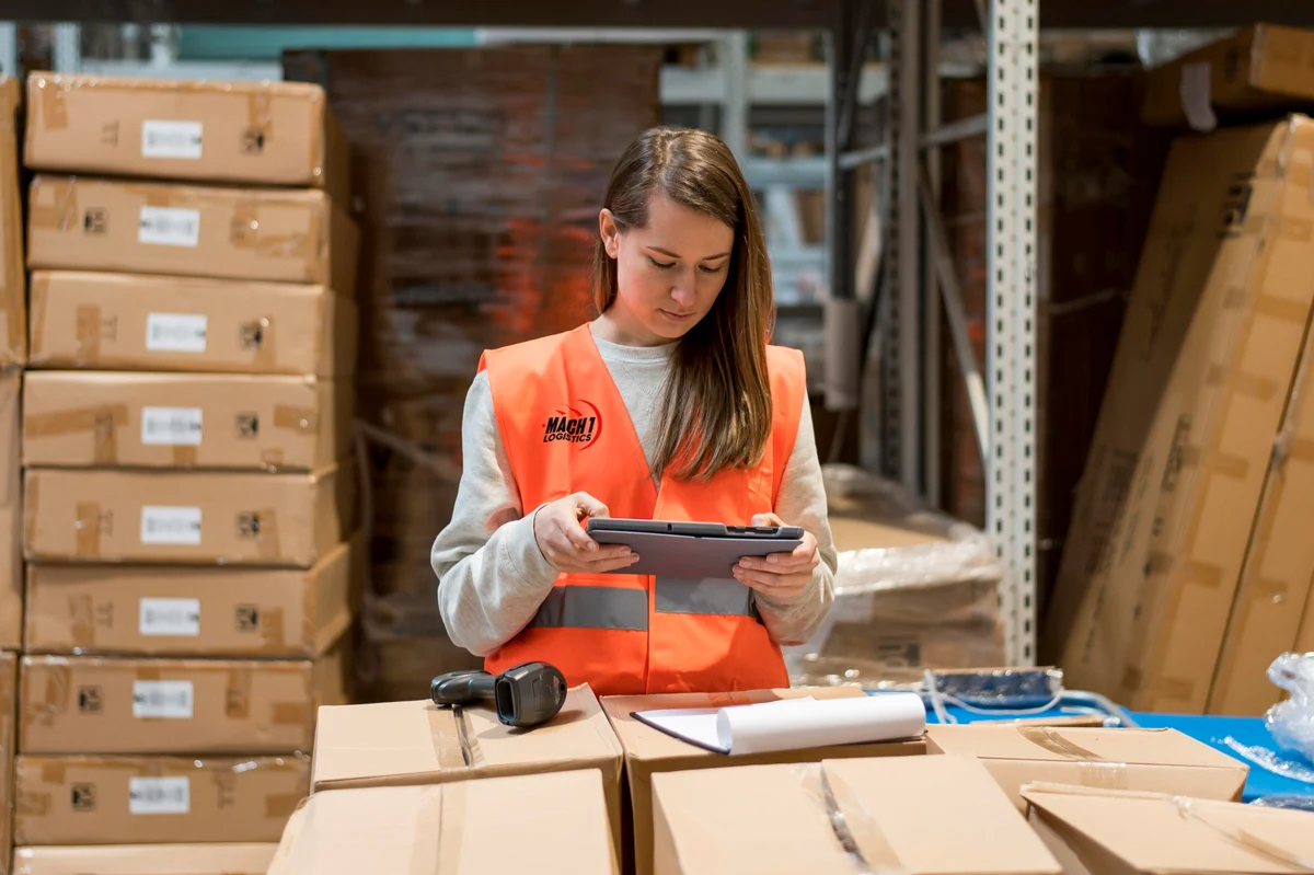MACH1 Logistics team member inspecting imported freight and verifying biosecurity compliance at our warehouse facility