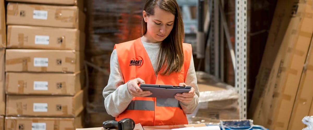 MACH1 Logistics team member inspecting imported freight and verifying biosecurity compliance at our warehouse facility