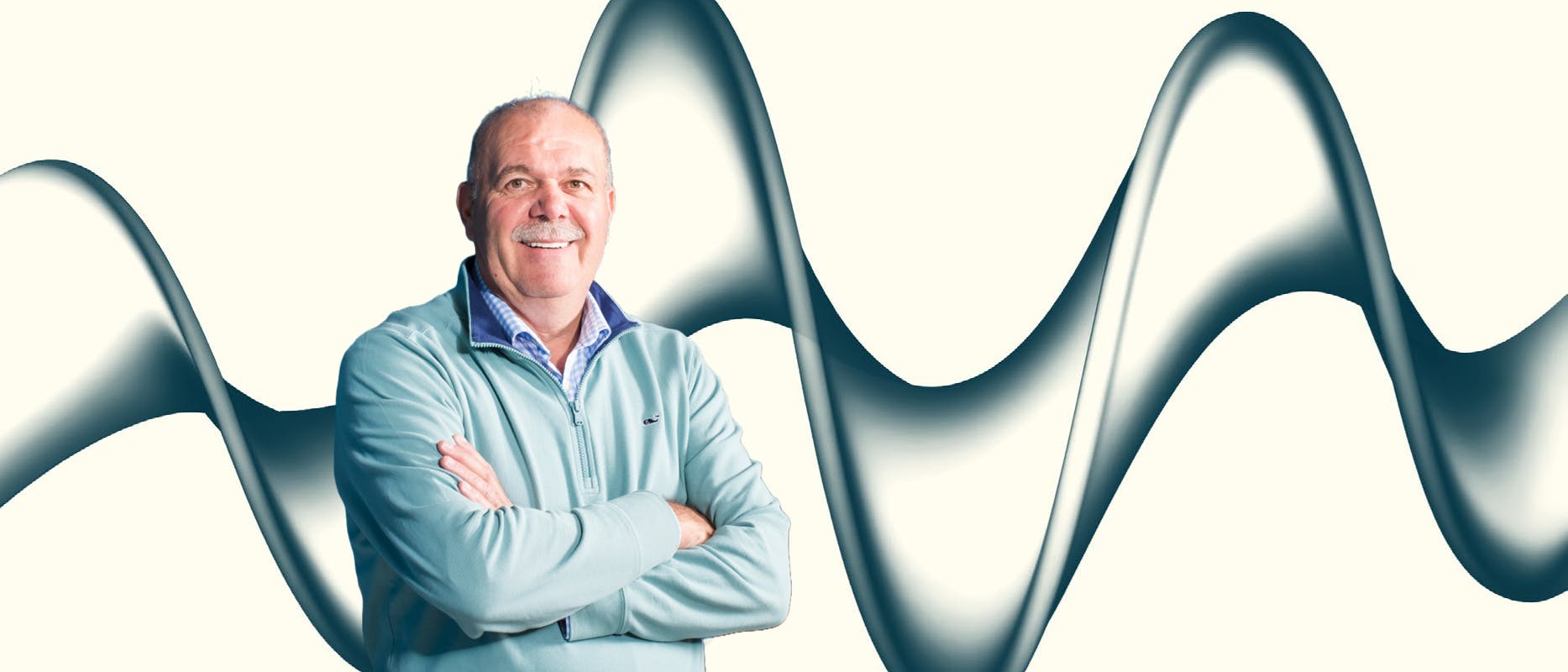 mage of man with folded arms and moustache on cream background with navy
wave