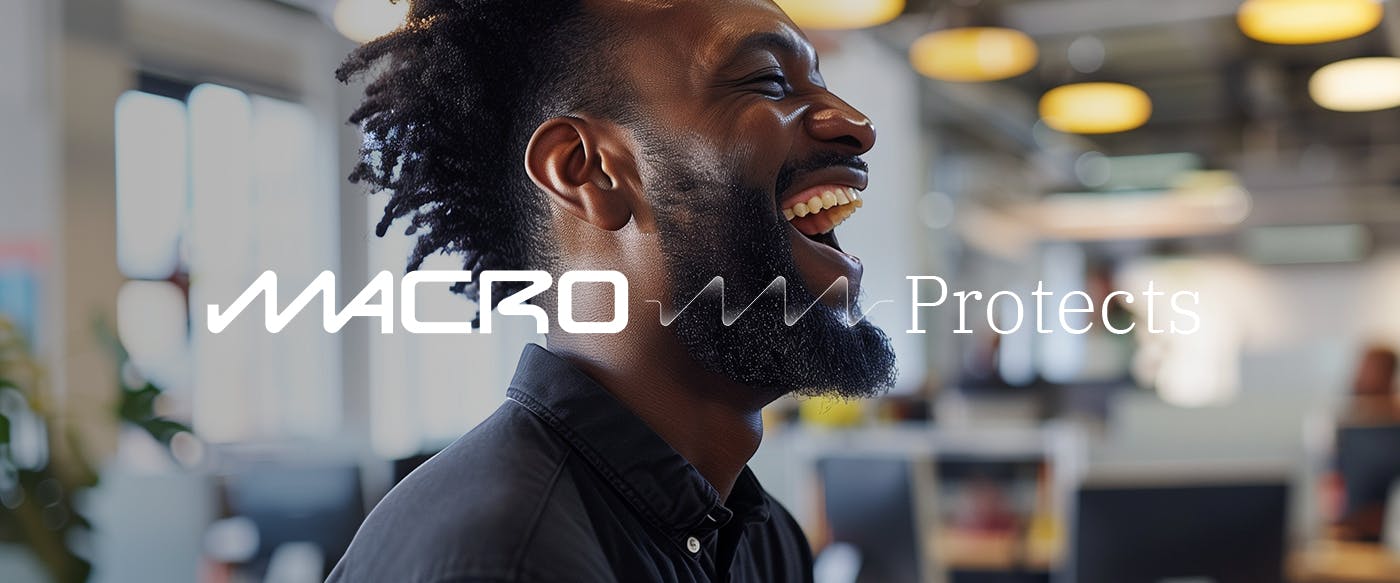 Happy and content man. Test says 'Macro Protects'