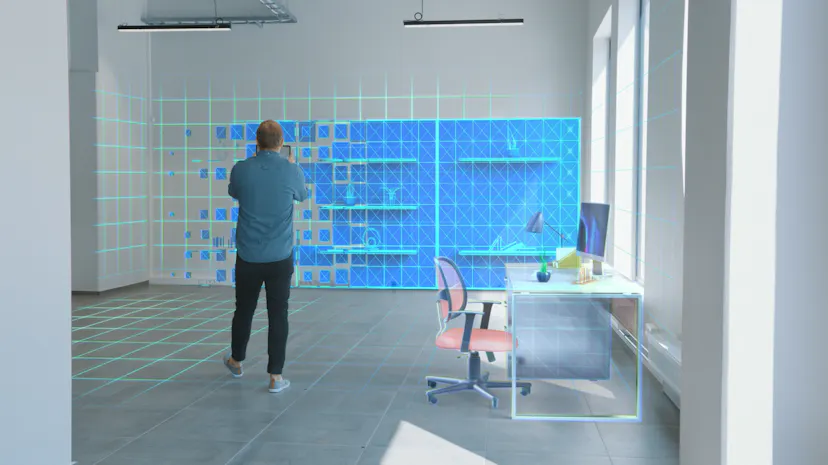 Man using virtual reality for office design