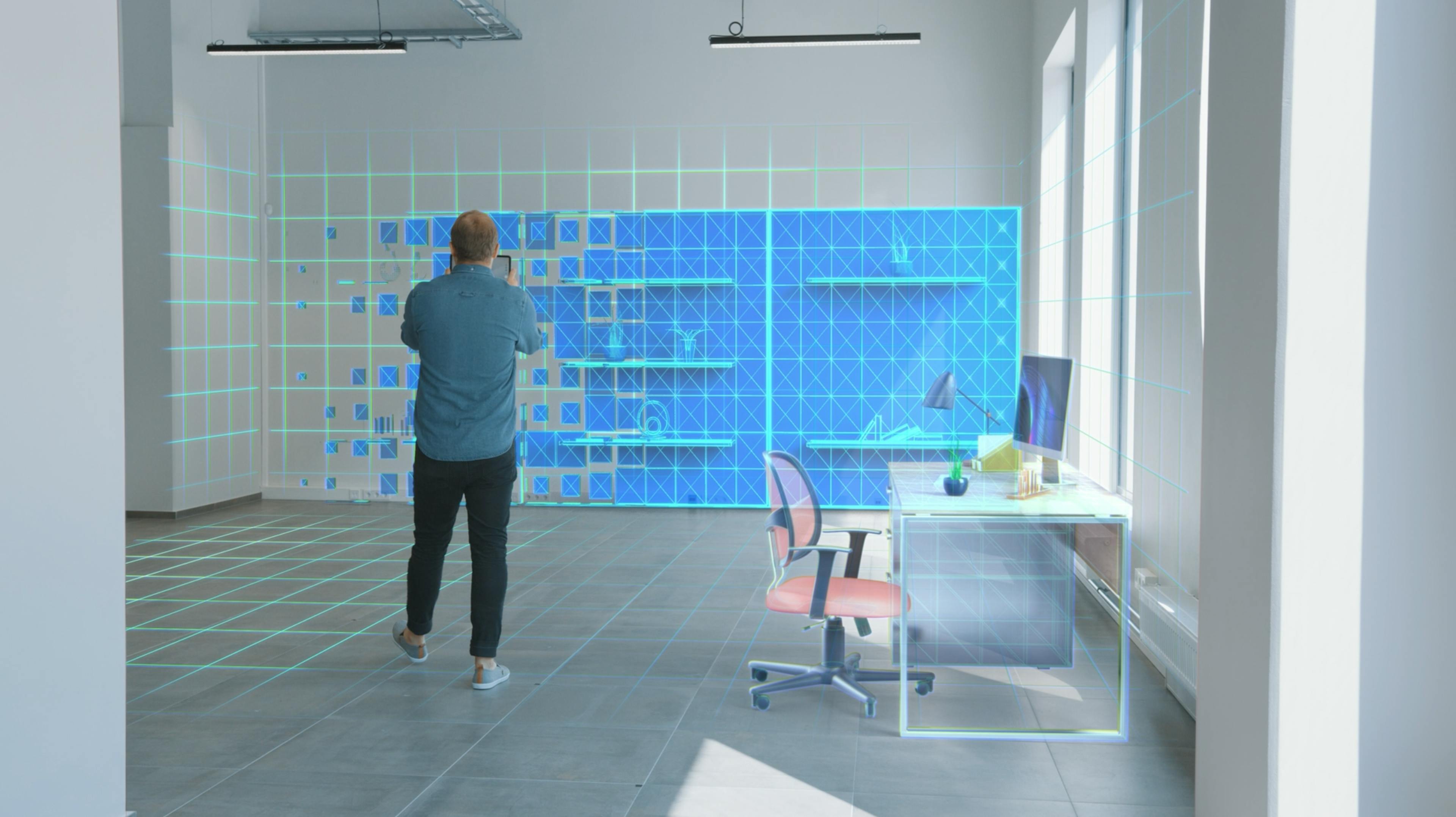 Man using virtual reality for office design