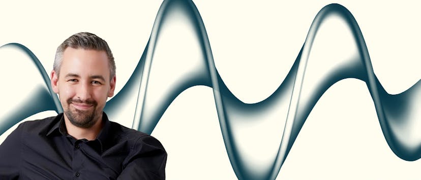 Image of a man in a black shirt on a cream background with grey wave

