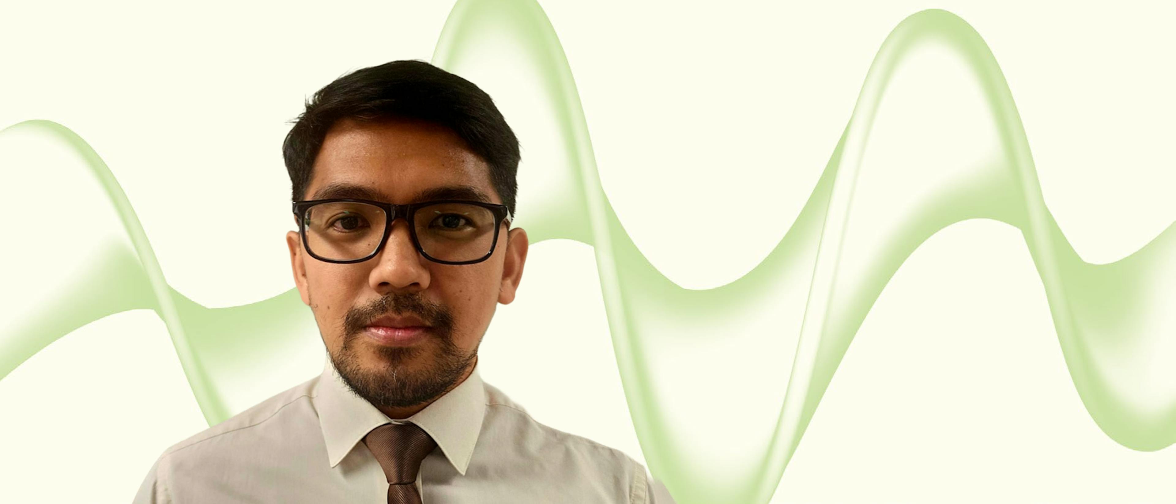 Image of man with beard on cream background with green wave