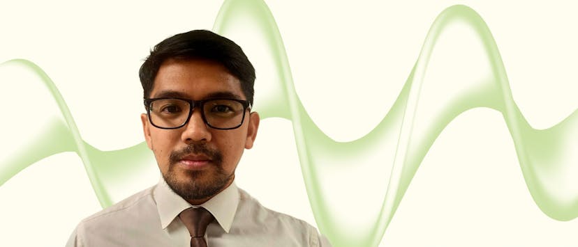 Image of man with beard on cream background with green wave