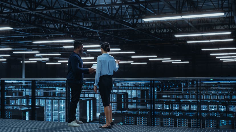 image of man and woman in a data centre